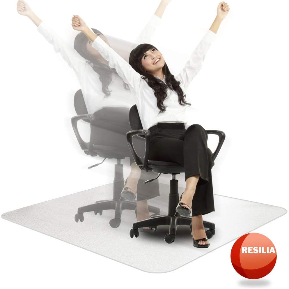 Woman throwing hands in the air on clear chair mat