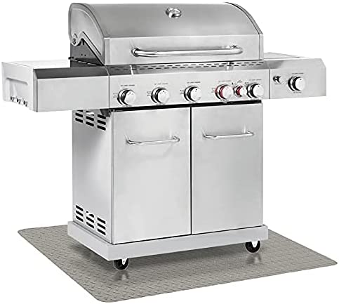 Large silver grill mat on top of a sandstone grill mat with diamond plate pattern