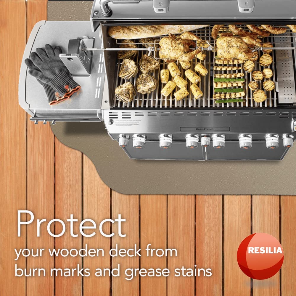Grill on top of tan beige grill mat on top of wooden deck for protection from burn marks and grease stains