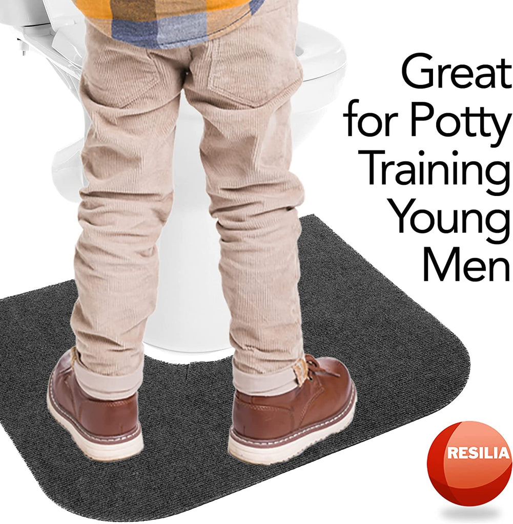 Child standing on commode mat because it is great for potty training young men