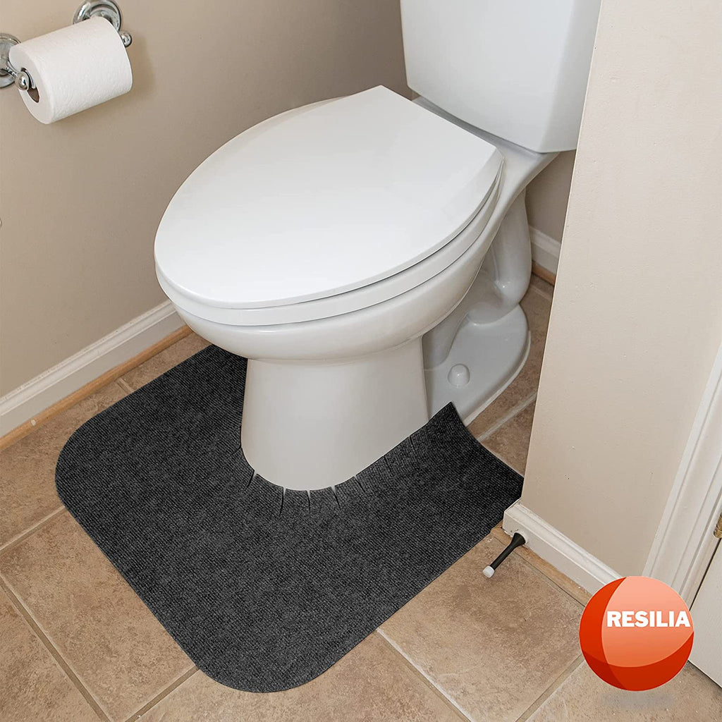 bathroom toilet with charcoal commode mat around the base of the toilet