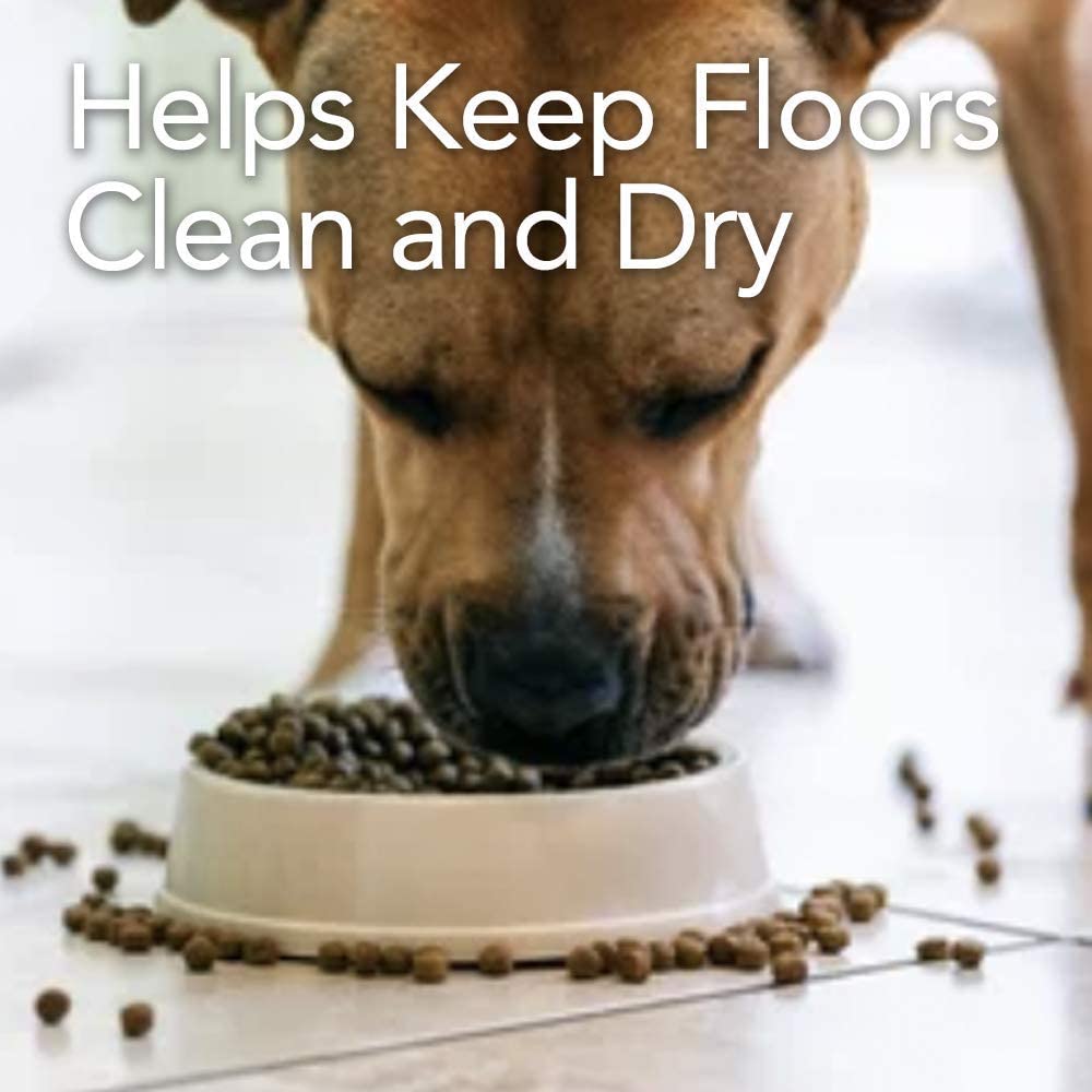 Dog messily eating from a bowl. Under pet cage mat helps keep floors clean and dry