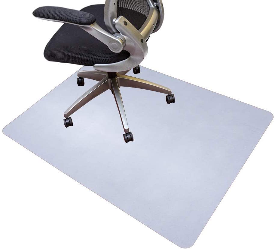 Desk chair on upper right corner of clear desk chair mat