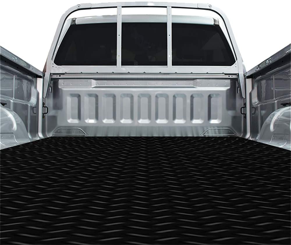Black truck mat in the back of a truck bed