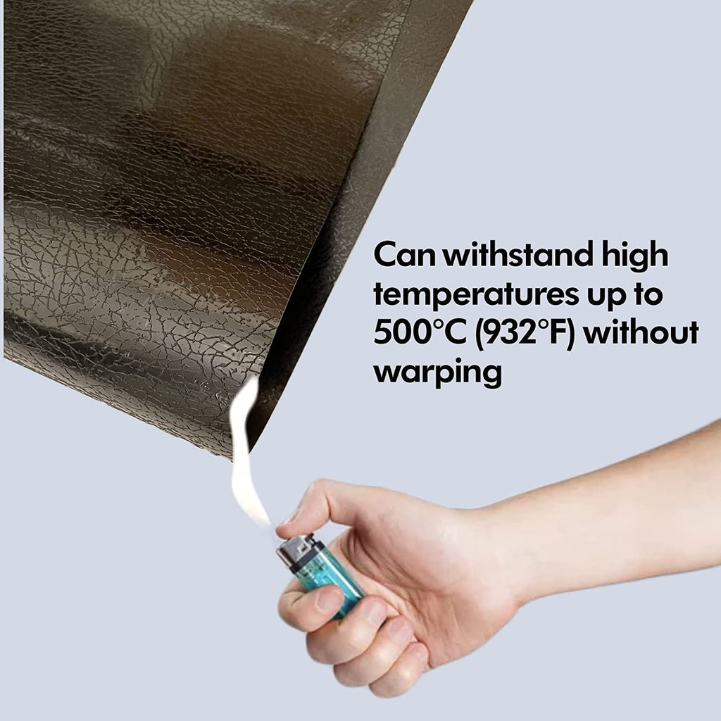 Hand heating up workbench mat with lighter. Mat can withstand high temperatures up to 500 degrees celsius (932 degrees fahrenheit) without warping 